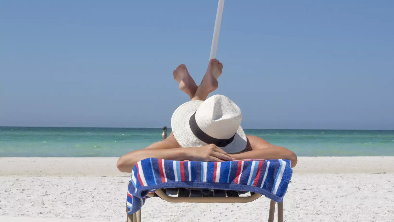 Person on lounge chair